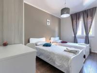 Postel nebo postele na pokoji v ubytování Apartment Nina by Interhome