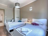 Postel nebo postele na pokoji v ubytování Apartment Nina by Interhome