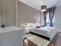 Postel nebo postele na pokoji v ubytování Apartment Nina by Interhome