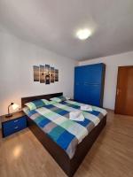 Posteľ alebo postele v izbe v ubytovaní APARTMANI LANA