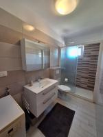 Kúpeľňa v ubytovaní APARTMANI LANA