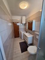 Kúpeľňa v ubytovaní APARTMANI LANA