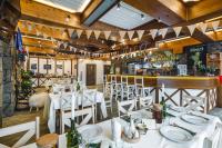 En restaurant eller et andet spisested på Gościniec Zaskalnik Szczawnica