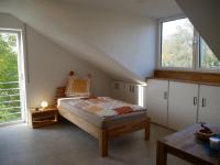 Postel nebo postele na pokoji v ubytování Ferienwohnung Haus Maria