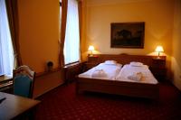 Postel nebo postele na pokoji v ubytování Hotel Slunce