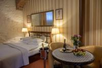Łóżko lub łóżka w pokoju w obiekcie Żabi Dwór - HOTEL - RESTAURACJA - SPA