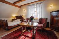 Łóżko lub łóżka w pokoju w obiekcie Żabi Dwór - HOTEL - RESTAURACJA - SPA