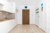 Kuchyňa alebo kuchynka v ubytovaní Osiedle Bursztynowe III by Jantar Apartamenty Kołobrzeg