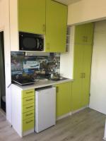 Kuchyňa alebo kuchynka v ubytovaní Milan Apartmanok
