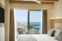 Łóżko lub łóżka w pokoju w obiekcie Iberostar Selection Es Trenc -New Opening-
