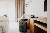 Posteľ alebo postele v izbe v ubytovaní Dorfcafe Unken Hotelpension sWirtshaus im Dorf
