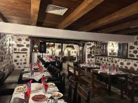 En restaurant eller et andet spisested på Family House Oreha