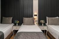 A bed or beds in a room at Beyazit Palace Hotel