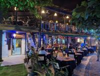 Un restaurant sau alt loc unde se poate mânca la Puthooram Seaview Cliff Resort