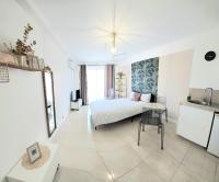 Posteľ alebo postele v izbe v ubytovaní Cannes Carnot 1