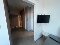 Telewizja i/lub zestaw kina domowego w obiekcie Apartment Sun Lakes - Sever