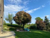 Vonkajšia záhrada v ubytovaní Gîte des Pommiers avec terrain de pétanque