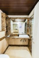 Ένα μπάνιο στο Skon Boutique by Orion Hotels
