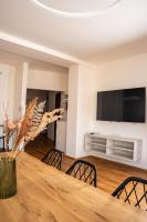 TV a/nebo společenská místnost v ubytování Hotel Sharingham