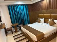 Hotel Air City Near Delhi Aiportにあるベッド