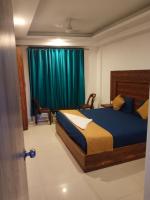 Hotel Air City Near Delhi Aiportにあるベッド