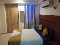 Hotel Air City Near Delhi Aiportにあるベッド