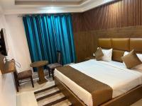 Hotel Air City Near Delhi Aiportにあるベッド