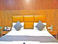 Hotel Air City Near Delhi Aiportにあるベッド