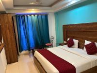 Hotel Air City Near Delhi Aiportにあるベッド