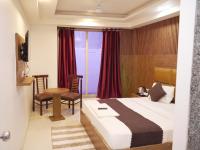 Hotel Air City Near Delhi Aiportにあるベッド