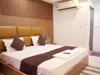 Hotel Air City Near Delhi Aiportにあるベッド
