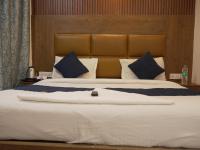 Hotel Air City Near Delhi Aiportにあるベッド