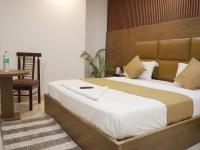 Hotel Air City Near Delhi Aiportにあるベッド