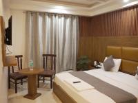 Hotel Air City Near Delhi Aiportにあるベッド