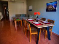 Televízia a/alebo spoločenská miestnosť v ubytovaní Cosy Apartments Daphne