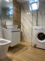 A bathroom at Comfortable Apartment Near The Sea