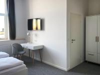 Best Boarding Houseにあるベッド