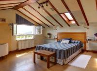 Postel nebo postele na pokoji v ubytování Hotel Mirador del Sella