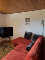 Telewizja i/lub zestaw kina domowego w obiekcie Chez Corinne