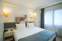 Postel nebo postele na pokoji v ubytování Sim Hotel Istanbul Old City