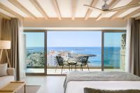 Łóżko lub łóżka w pokoju w obiekcie Iberostar Selection Es Trenc -New Opening-