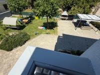 Vonkajšia záhrada v ubytovaní Apartments Puntamika