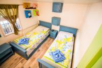 Postel nebo postele na pokoji v ubytování Стальовата Къща - Stalyovata House