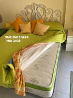 Posteľ alebo postele v izbe v ubytovaní Holiday House Naxos