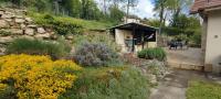Vonkajšia záhrada v ubytovaní LE MACHAON , Gîte rural *** avec espace piscine privé