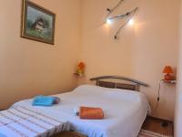 Posteľ alebo postele v izbe v ubytovaní Villa Rose Apartment
