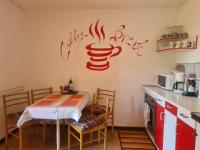 Kuchyňa alebo kuchynka v ubytovaní Villa Rose Apartment