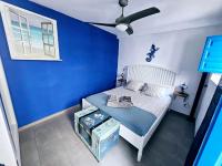 Postel nebo postele na pokoji v ubytování Casa mi sùeño azul