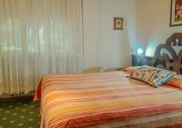 Posteľ alebo postele v izbe v ubytovaní Bridge Hotel