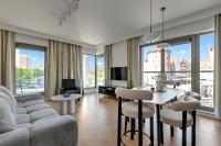 Ein Sitzbereich in der Unterkunft Waterlane Riverside - SPA, Pool, Gym &amp; Parking by Downtown Apartments